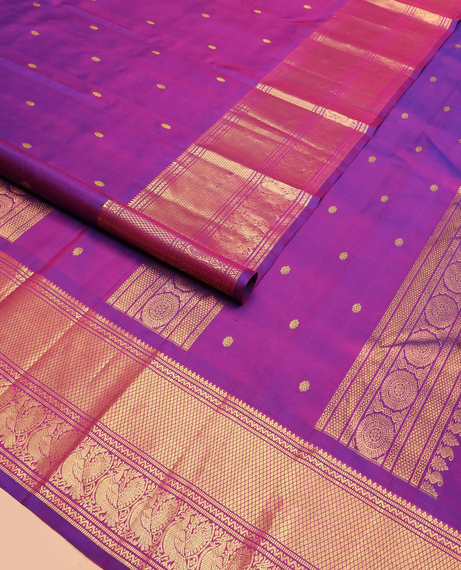 Rani pink zari buttas Kanchipuram silk saree, zari border of neli, muthu, mayil kann, and mayil designs, and pallu of traditional designs