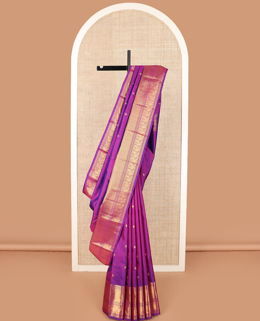 Rani pink zari buttas Kanchipuram silk saree, zari border of neli, muthu, mayil kann, and mayil designs, and pallu of traditional designs