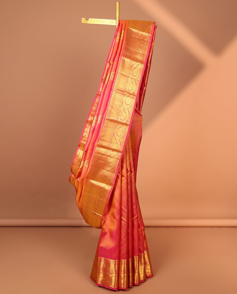 Orange buttas kancheepuram silk saree with contrast paisley, muthu, paun, kathir, poo chakram design & zari design pallu