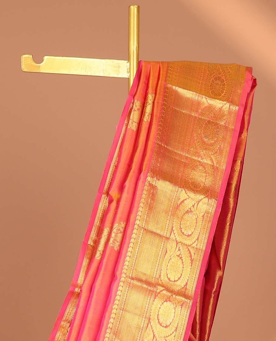 Orange buttas kancheepuram silk saree with contrast paisley, muthu, paun, kathir, poo chakram design & zari design pallu
