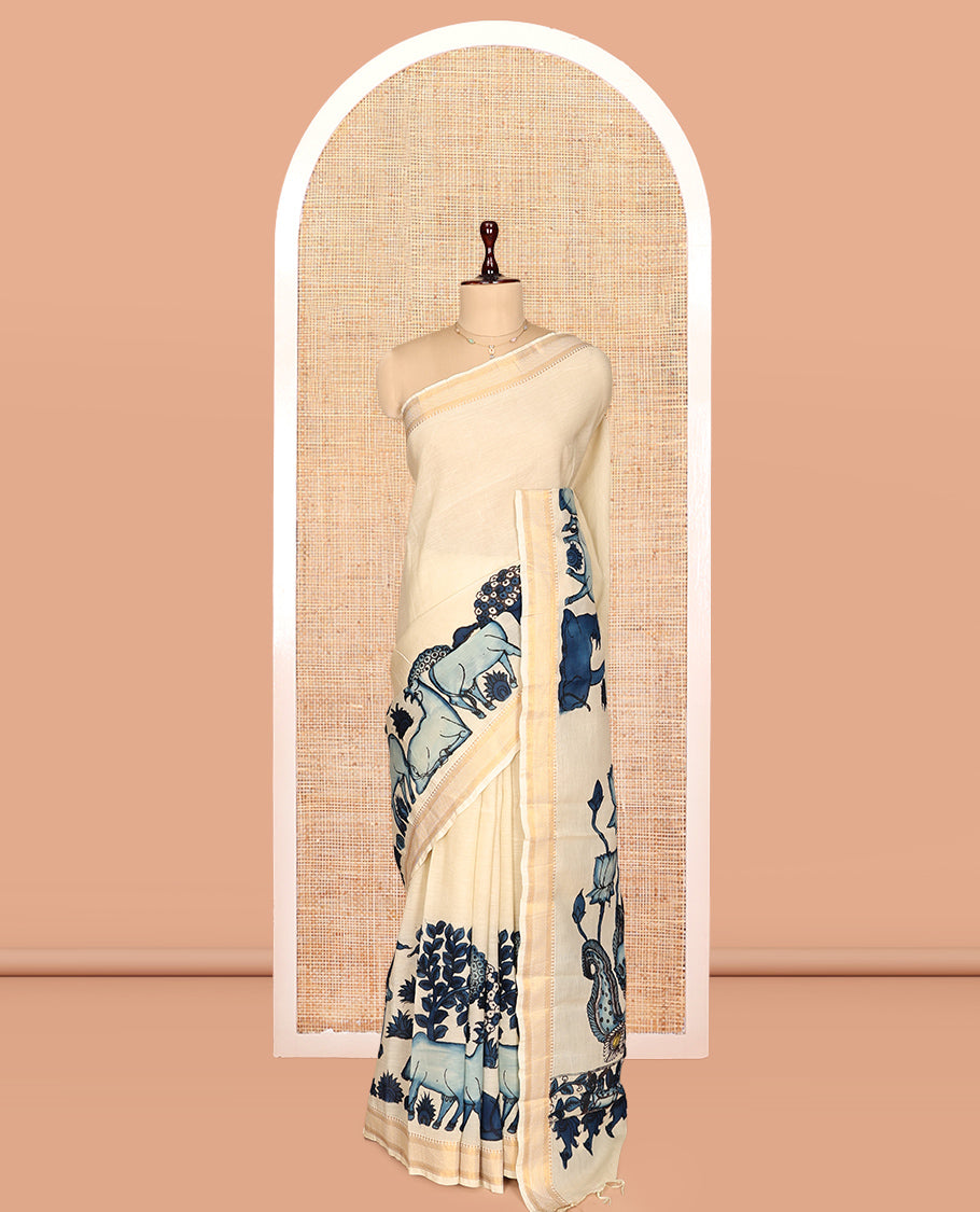 Cream Kalamkari Silk Saree, Crafted with Flora-Fauna Motifs, a Traditional Zari Border, Peacock Kalamkari Pallu, and a Matching Blouse