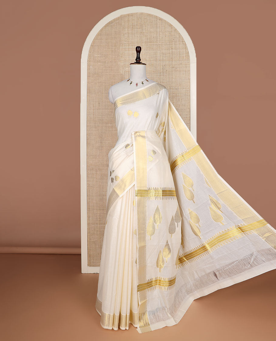Cream pine tree zari buttas Kerala saree, traditional zari border, and pallu of pine tree motifs
