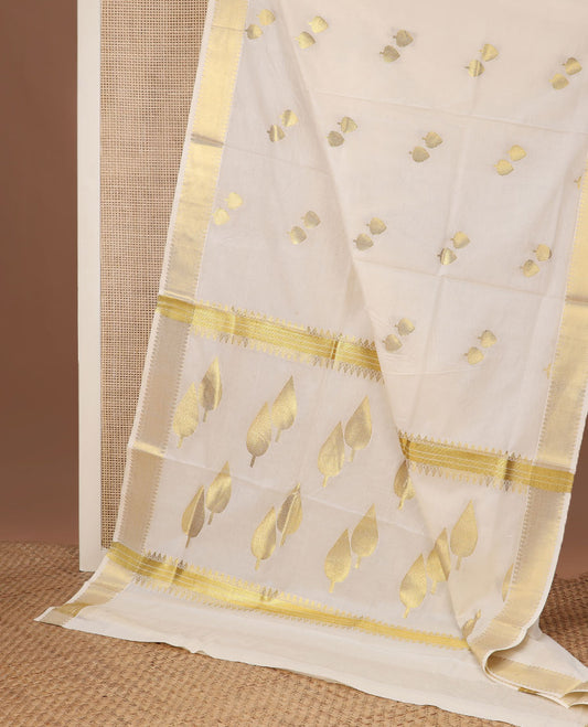 Cream pine tree zari buttas Kerala saree, traditional zari border, and pallu of pine tree motifs