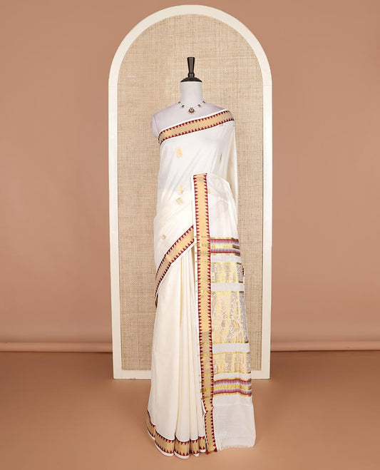 Cream gold zari buttas Kerala cotton saree, zari temple border, and pallu of intricate zari designs