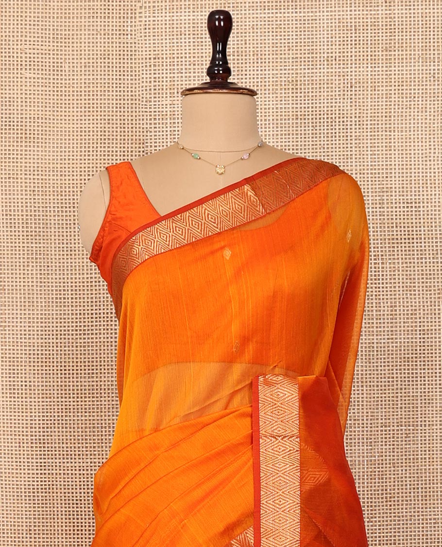 Orange Maheshwari Cotton Saree, Subtly Enriched with Buttas on Its Body, Highlighted by Chevron Zari Design Border, Pallu of Zari Designs, and Paired with a Matching Blouse