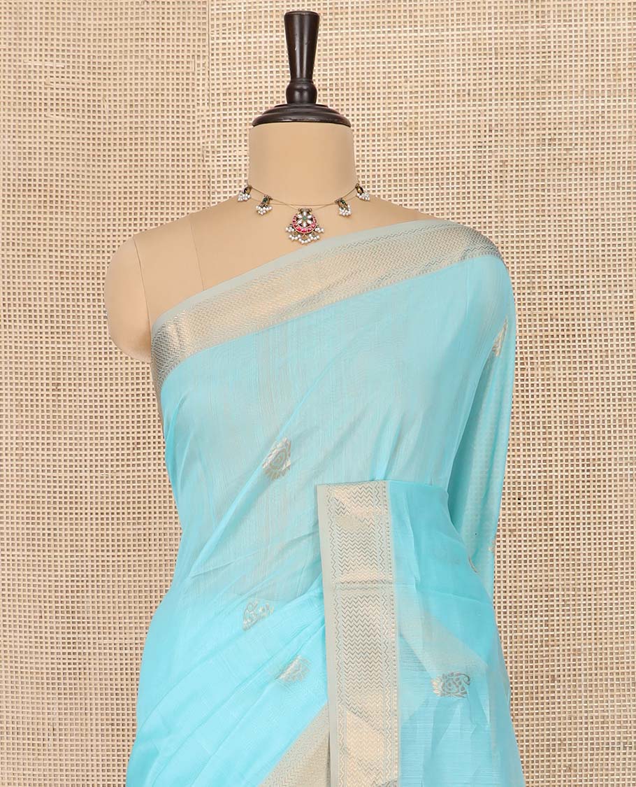 Blue Maheshwari Cotton Saree Embellished with Zari Buttas, Highlighted with Contrast Traditional Zari Design Border, Pallu Steeped with Paisley Designs, and Paired with a Contrast Blouse