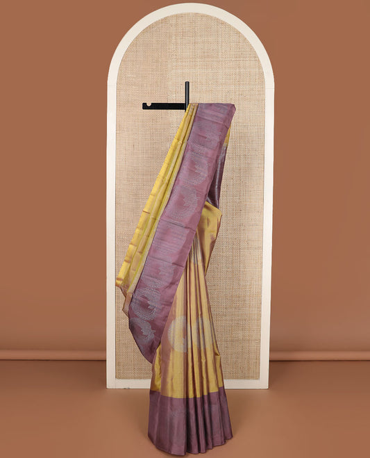 Green zari buttas soft silk saree, contrast round motif border & pallu of floral & geometric designs