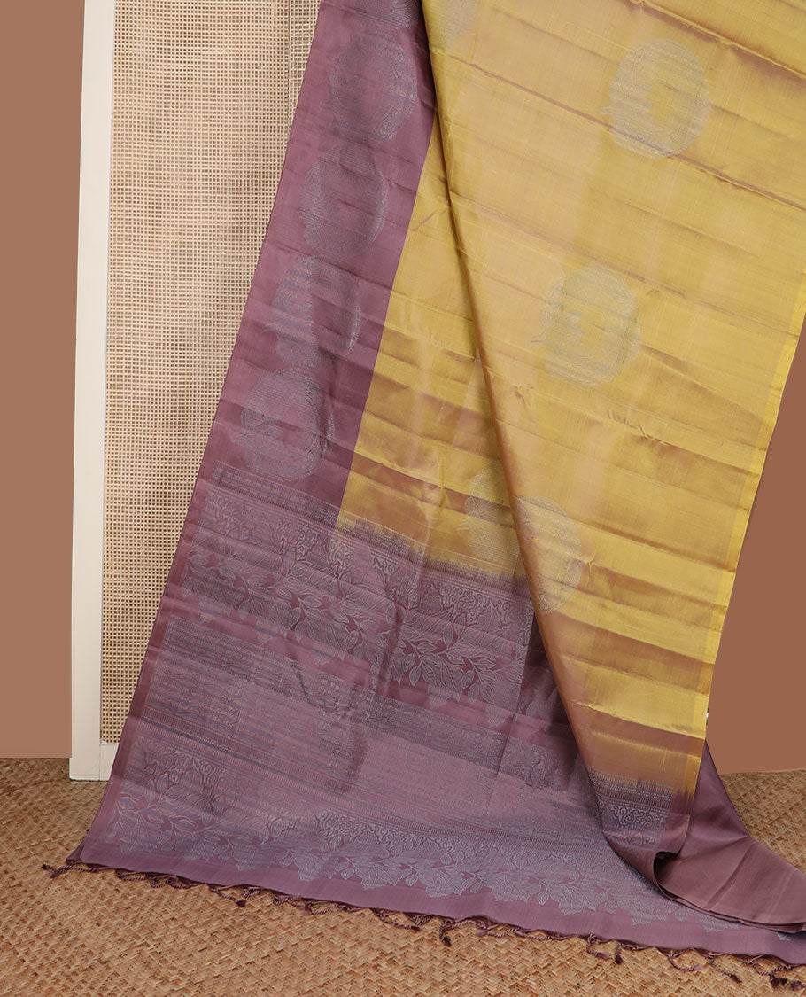 Green zari buttas soft silk saree, contrast round motif border & pallu of floral & geometric designs