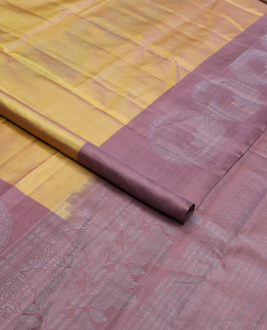 Green zari buttas soft silk saree, contrast round motif border & pallu of floral & geometric designs