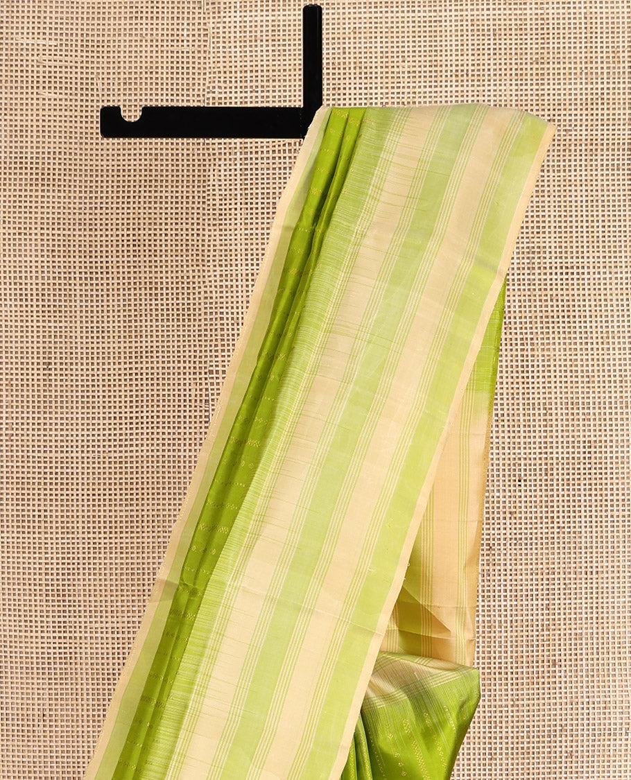 Green Mayuri Soft Silk Saree, Detailed with Zari Stripes, Complemented by a Contrast Border, Pallu of Zari Designs, and Contrast Blouse