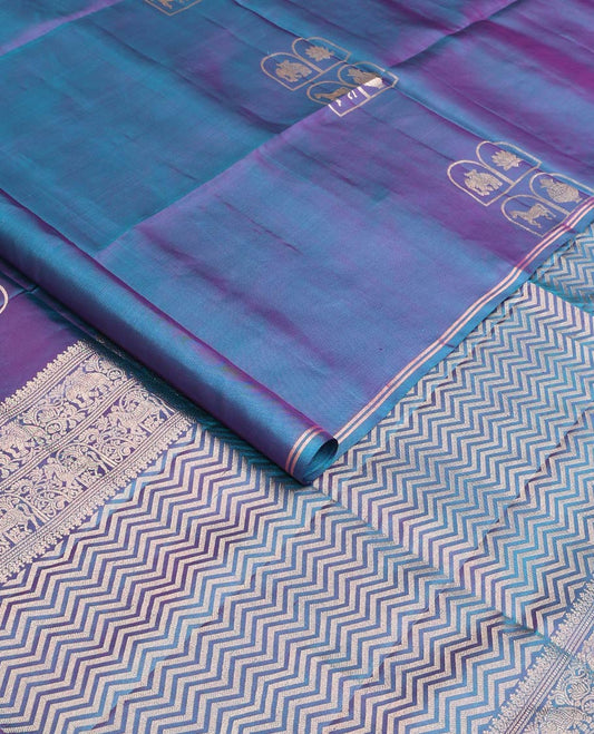 Borderless blue kuthirai, kamalam, yaanai, and Kumbha enclosed Mughal arches soft silk saree, pallu of chevron designs