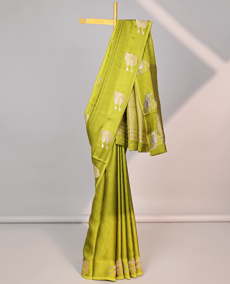 Green mushru silk saree with self bird motifs border & pallu of argyle pattern