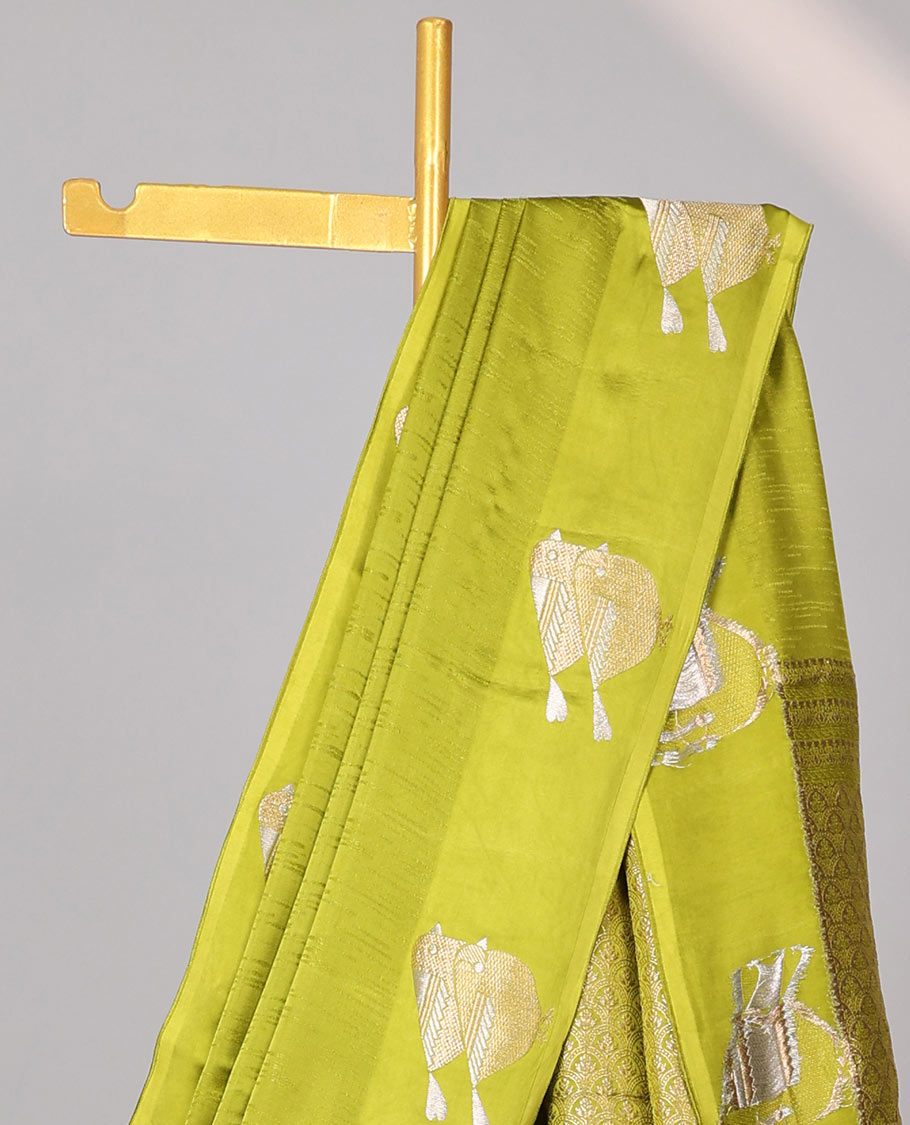 Green mushru silk saree with self bird motifs border & pallu of argyle pattern