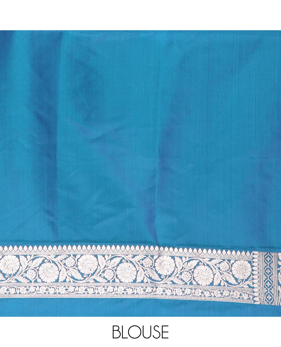 Blue floral buttas mushru silk saree, floral-creeper design zari border, and jaal pallu