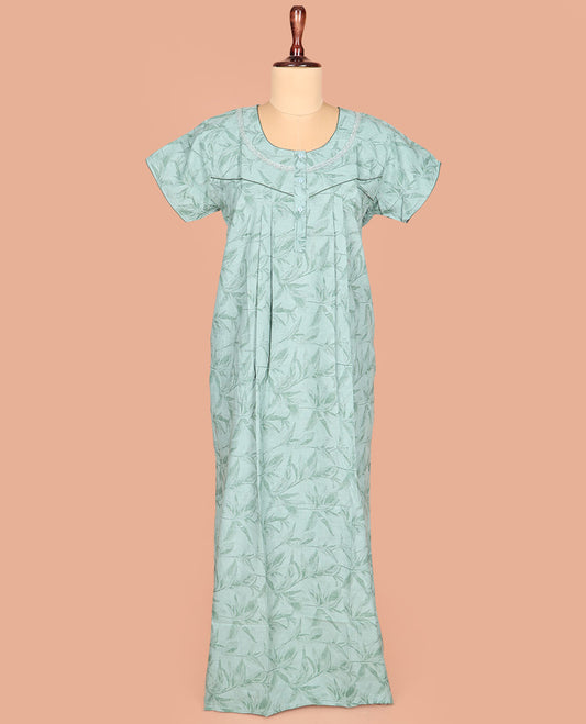 Green-Shade Cotton Nighty Subtly Adorned with Floral Patterns Print, Featuring Lace Work, Round Front Neck, and Half Sleeves