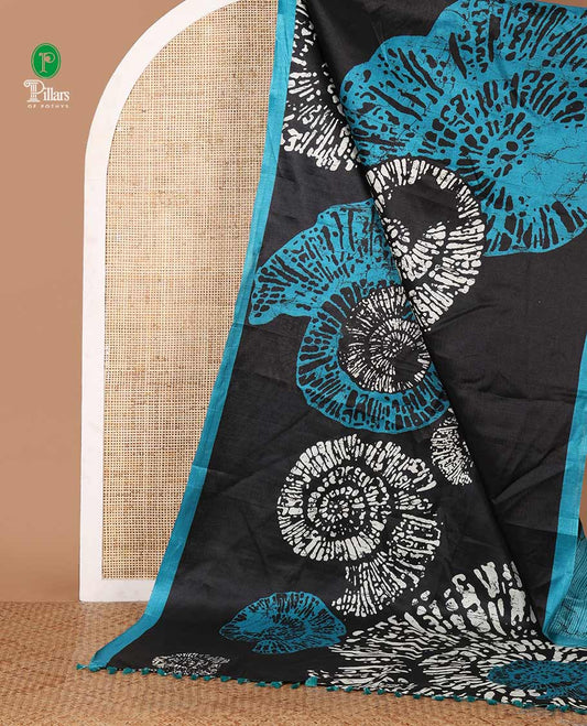 Black batik-style uniquely printed khadi cotton saree, contrast blue piping border & printed pallu