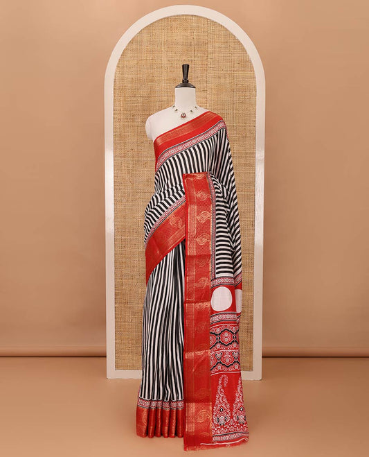 Red stripes printed soft dola saree,contrast floral creeper design zari border,Ajrakh-print pallu & blouse of floral butta & zari design