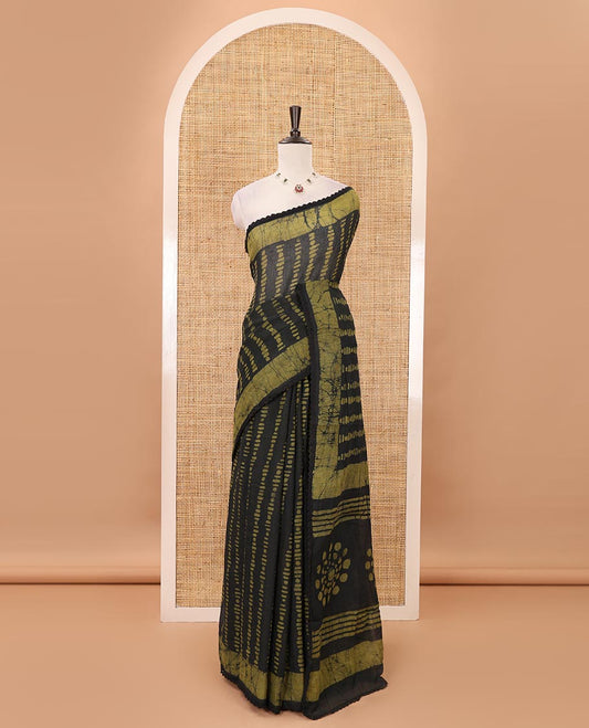 Black handblock wax batik printed kota check saree, contrast batik print lacework border, batik print pallu & polka dots print blouse