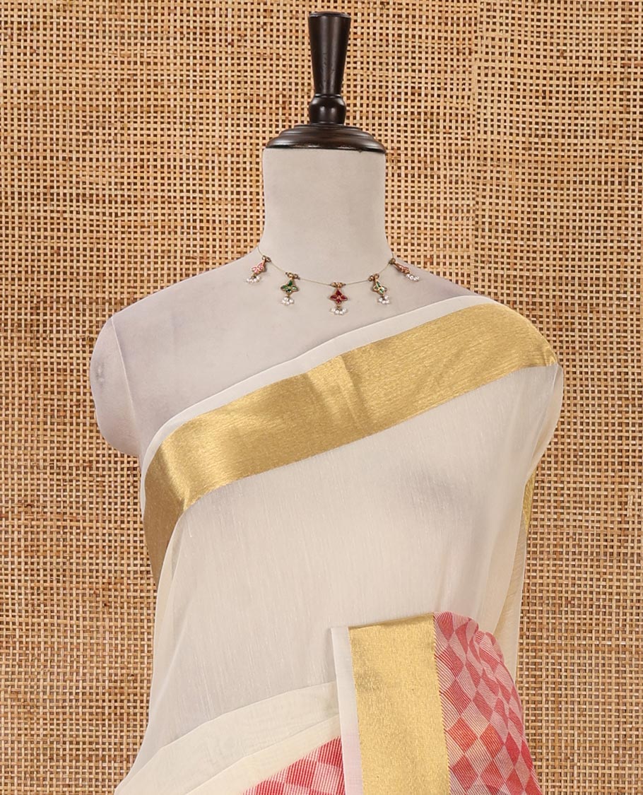Cream with pink kerala cotton saree , diamond style printed with gold zari tissue bawanchi border & diamond pattern printed pallu with plain blouse