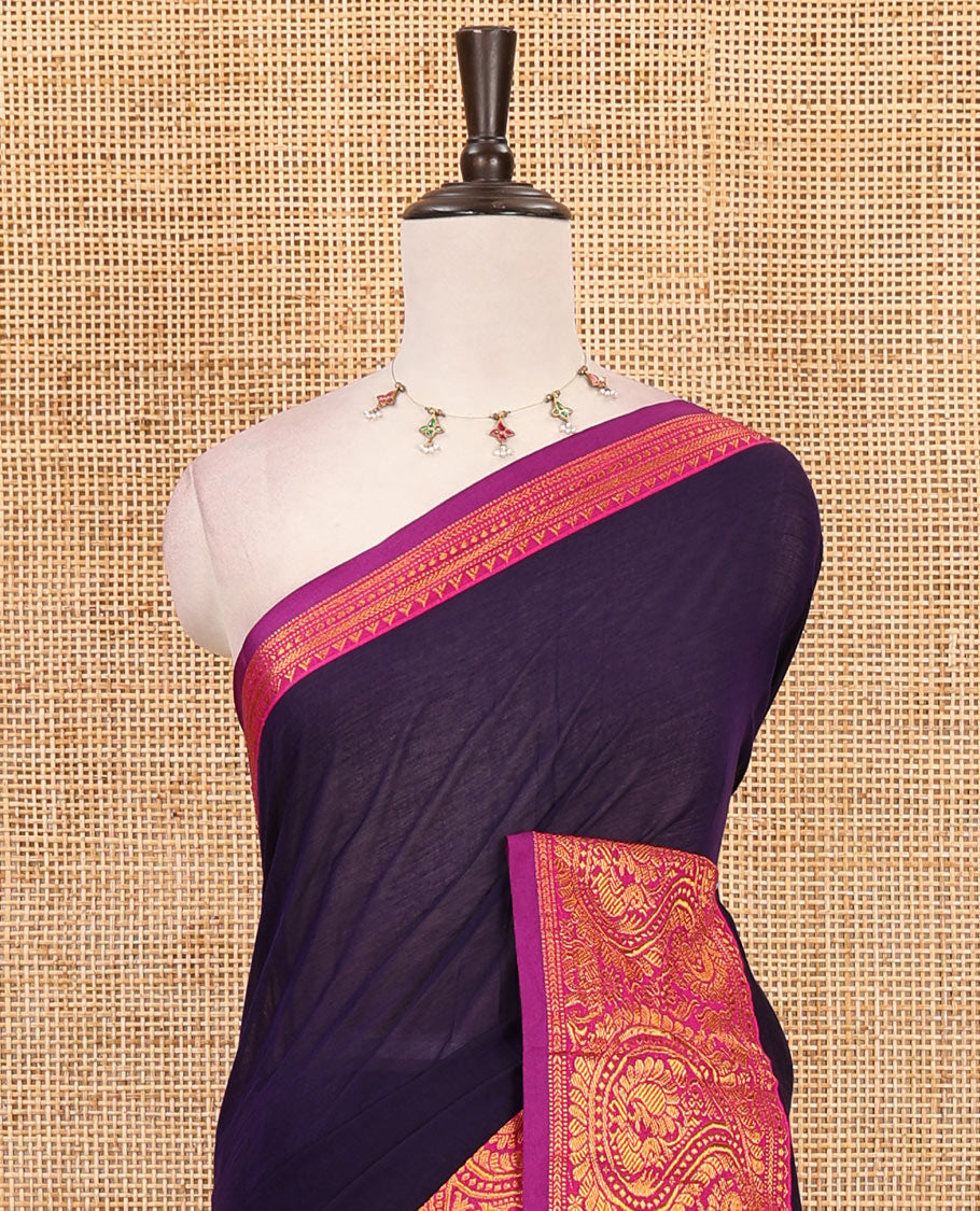 Purple plain design mercerised cotton saree, contrast traditional peacock enclosed manga border, striped pallu & matching blouse