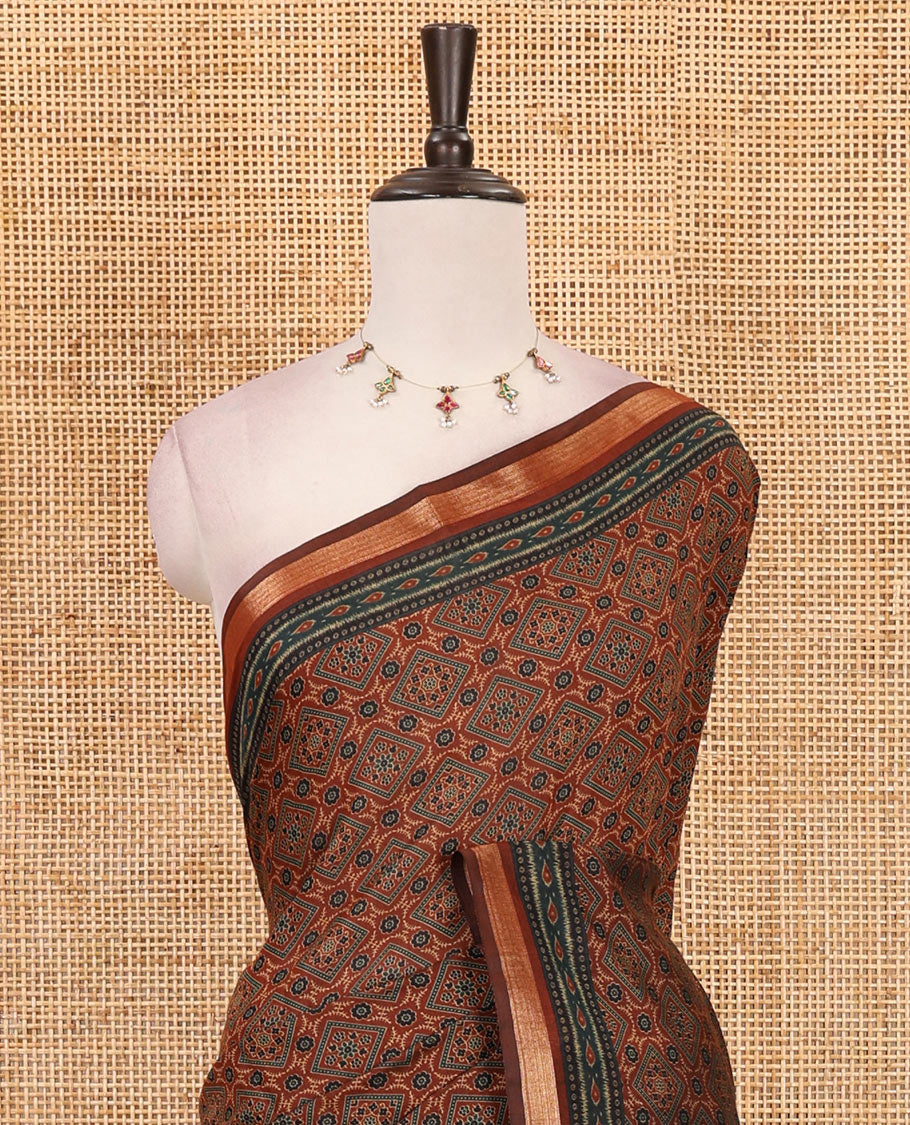 Brown argyle Ajrakh-style printed Muslin cotton saree, zari border, geometric printed pallu & argyle printed blouse