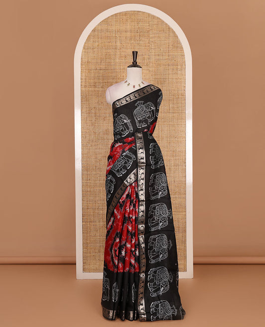 Black-maroon shibori printed muslin cotton saree, contrast batik elephant print border of zari annam, batik elephant pallu, and contrast polka dots print blouse