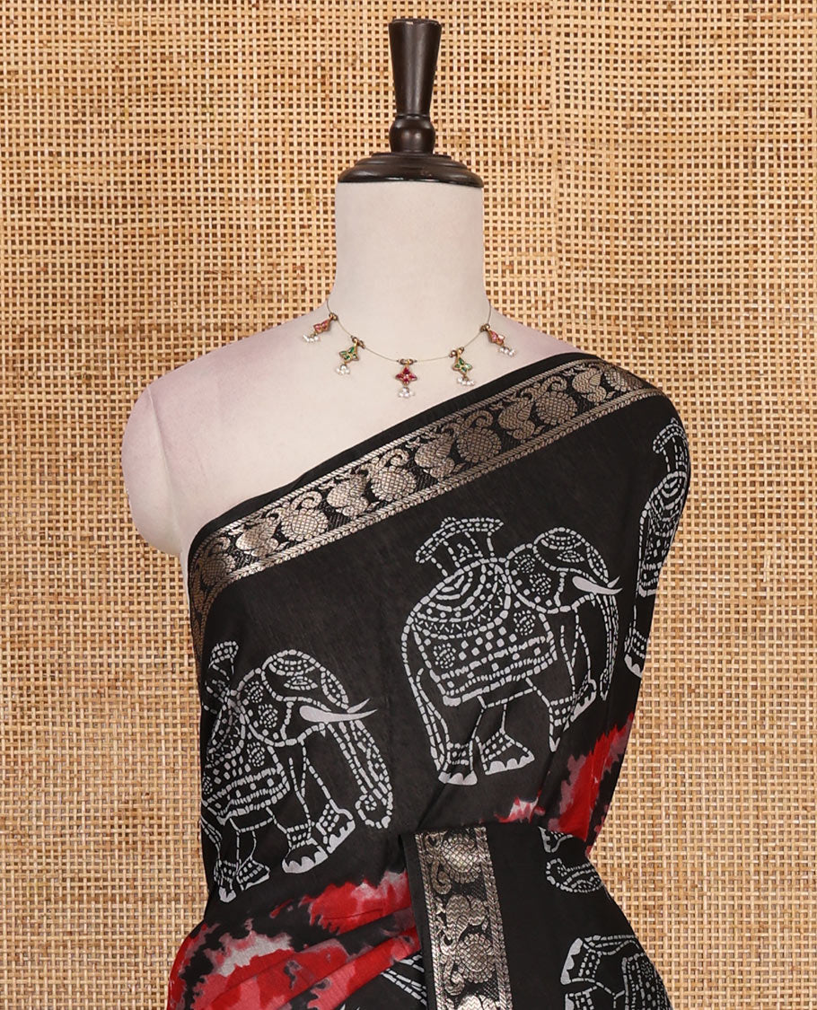 Black-maroon shibori printed muslin cotton saree, contrast batik elephant print border of zari annam, batik elephant pallu, and contrast polka dots print blouse