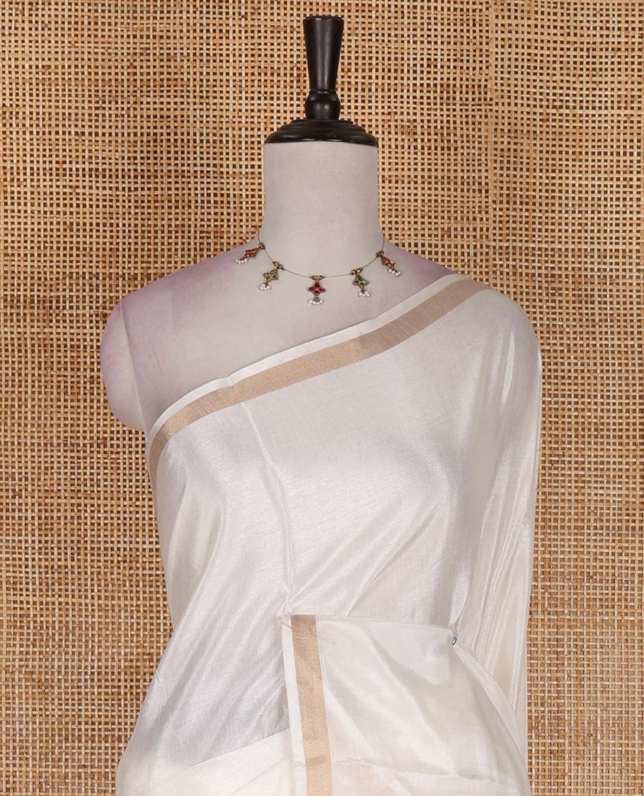 Half-white floral, and kathakali motifs digitally printed Kerala cotton saree, zari border, striped pallu, and matching blouse