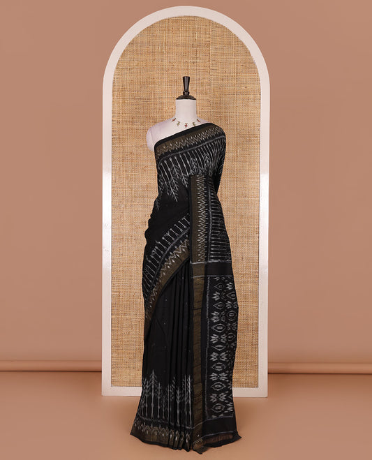 Black buttas and floral like ikkat woven ikkat cotton saree, zari bavanji border, ikkat design pallu, and plain blouse