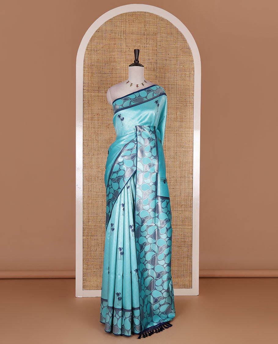 Blue jacquard kanchi silk saree, contrast border, and pallu steeped with paisley motifs with contrast zari design blouse