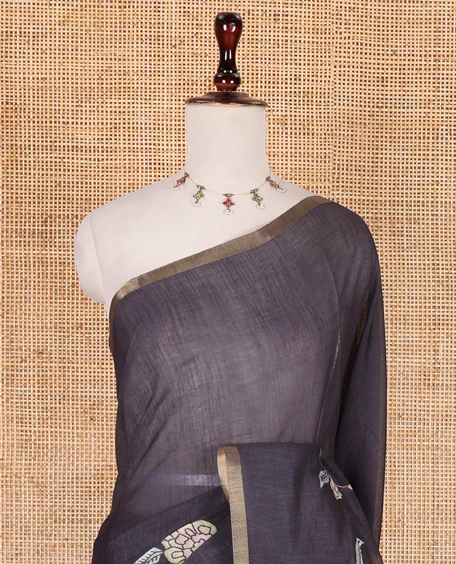 Black kalamkari floral vine, and elephant motifs printed linen cotton saree, piping border, printed pallu, and a contrast elephant motifs printed blouse