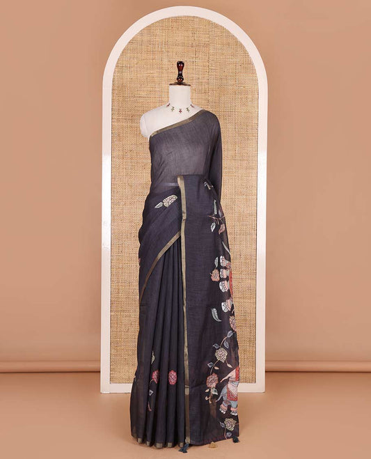 Black kalamkari floral vine, and elephant motifs printed linen cotton saree, piping border, printed pallu, and a contrast elephant motifs printed blouse