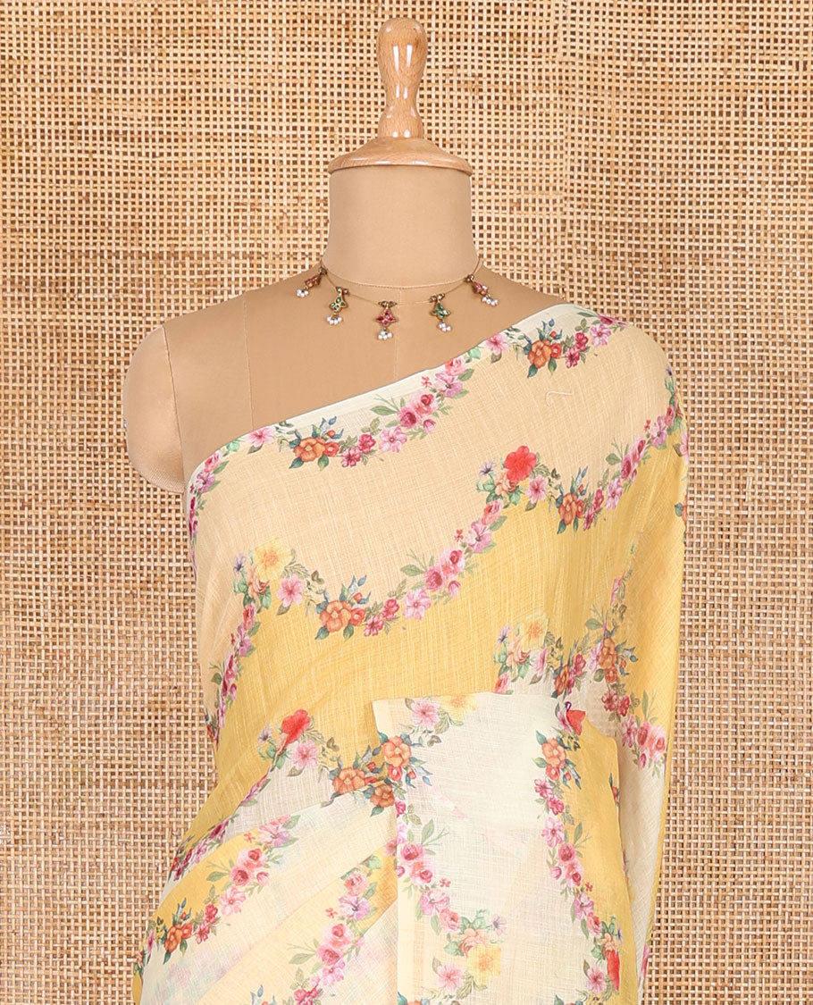 Borderless yellow rangkat style dyed and floral printed linen cotton saree with a contrast printed blouse