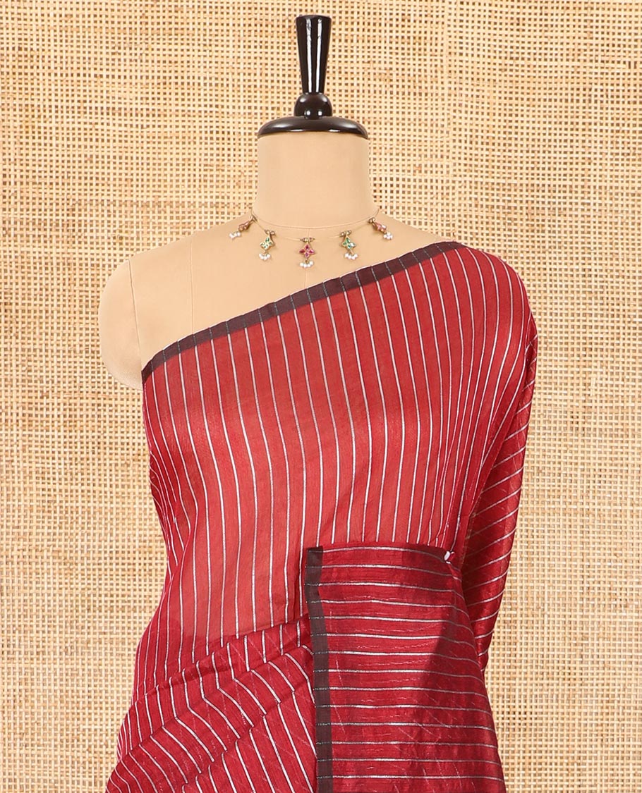 Borderless maroon zari vertically striped khadi mul cotton saree, gleaming zari pallu and a matching blouse
