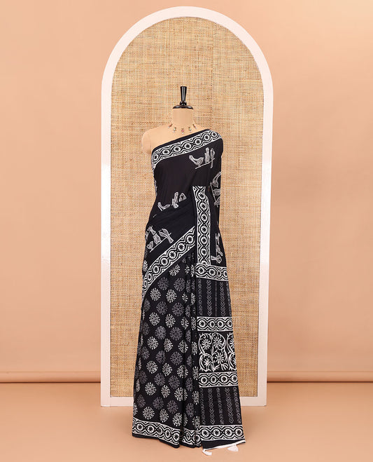 Black sparrow motifs hand block printed soft mul cotton, block printed border, pallu of floral-geometric print, and a hand block printed blouse