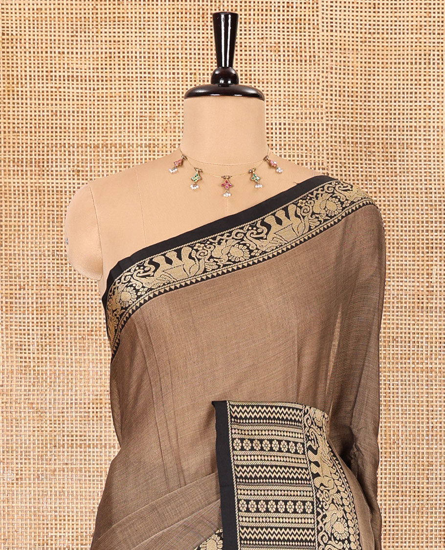 Brown plain mercerised cotton saree, contrast traditional motifs thread woven border, striped pallu, and a matching blouse