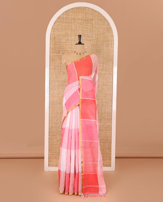 Baby pink multi-colored checked linen cotton saree, piping zari border, striped pallu, and multi-color printed blouse
