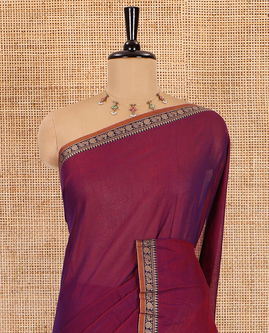 Purple plain mercerised cotton saree, contrast temple traditional border, striped pallu, and a matching blouse