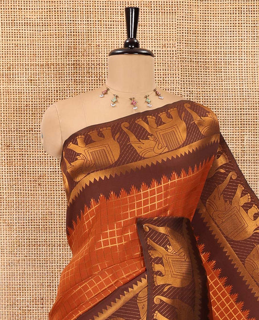 Rust orange-brown zari checked kanchi silk saree, contrast elephant motifs zari border, traditional zari design pallu, and a jacquard blouse