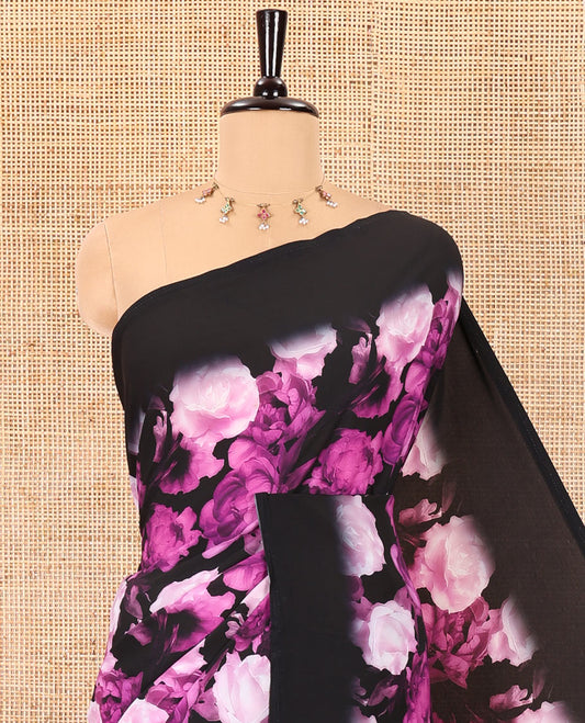 Borderless black and violet floral printed satin crepe saree, floral printed pallu, and a matching floral printed blouse