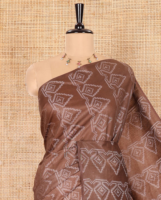 Borderless Brown Bhagalpur Cotton Saree Featuring Intricate Motifs in Resham Thread Weave, Pallu Adorned with Resham Thread Designs and Sequin Stripes, and Paired with a Plain Matching Blouse