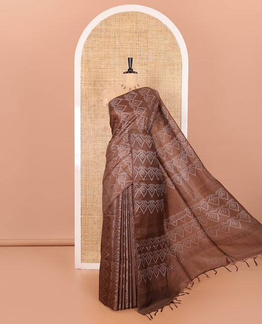 Borderless Brown Bhagalpur Cotton Saree Featuring Intricate Motifs in Resham Thread Weave, Pallu Adorned with Resham Thread Designs and Sequin Stripes, and Paired with a Plain Matching Blouse