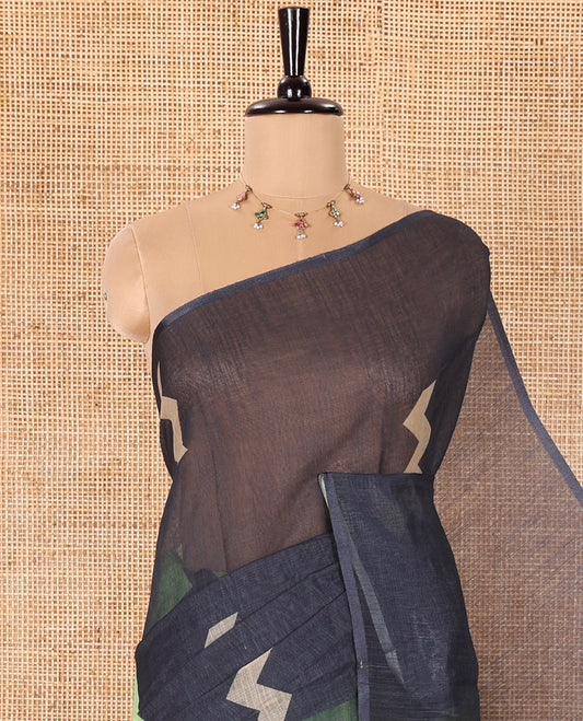 Borderless Parrot Green Linen Cotton Saree, Creatively Printed with Zig-Zag Geometric Motifs, Pallu Mirrors the Same Motifs, and Paired with a Contrast-Printed Blouse