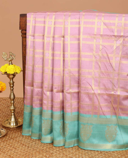 Pink check pattern soft silk saree with peacock design border & peacock design pallu along with peacock zari border blouse