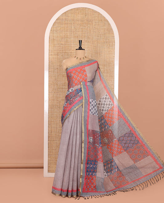 Multi-Color Linen Saree, Adorned with Colorfully Ajrakh Printed Checks, Chevron Striped Border, Pallu Mirrors the Same Print, and Paired with a Contrast Blouse