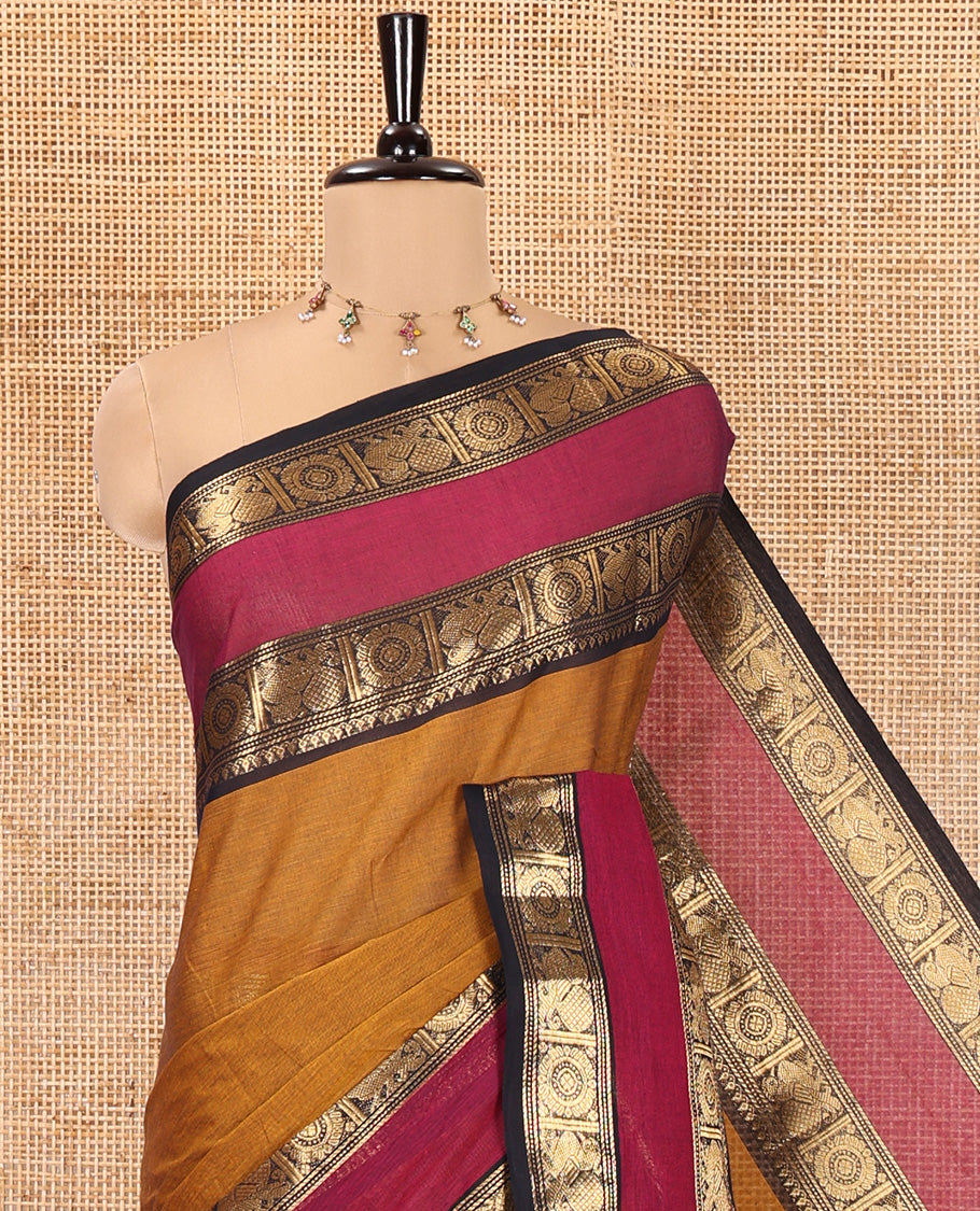 Mustard Chettinad Cotton Saree, Sparsely Woven with Buttas on Its Body, Complemented by a Contrast Rettai Pettu Border of Thilakam, and Peacock-Chakram Designs, Pallu of Stripes and Buttas, and Paired with a Matching Blouse