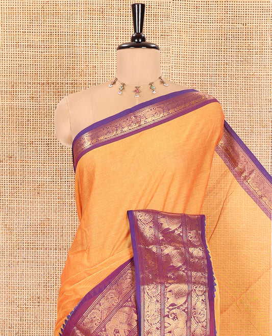 Orange Plain Chettinad Cotton Saree, Complemented by a Captivating Contrast Traditional Temple Border of Peacock-Elephant Designs, Subtly Striped Pallu, and Paired with a Matching Blouse