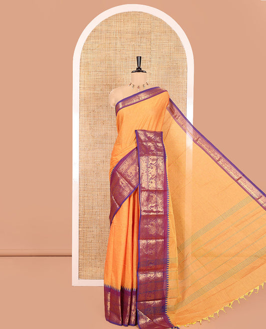Orange Plain Chettinad Cotton Saree, Complemented by a Captivating Contrast Traditional Temple Border of Peacock-Elephant Designs, Subtly Striped Pallu, and Paired with a Matching Blouse