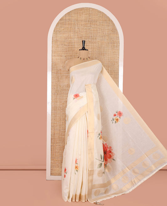 Cream Banaras Tissue Saree, Decked Up with Floral Motifs Print and Zari Buttas on Its Body, Subtle Bavanji Border, Pallu Pictures Floral Prints, and Paired with a Matching Floral Printed Blouse