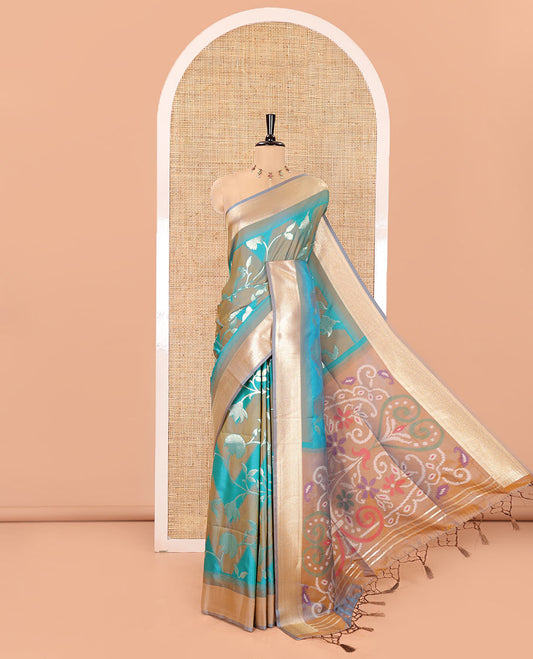 Blue Mulberry Soft Silk Saree, Embellished with Zig-Zag Stripes and Floral Jaal Design on Its Body, Highlighted by a Zari-Decked-Up Border, Pallu Features an Ikkat Design Weave, and Paired with a Blouse